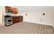 Kitchenette featuring a stainless steel range, microwave, and built-in wine cooler at 10502 Old Ardrey Kell Rd, Charlotte, NC 28277