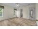 Bedroom featuring hard wood floors, neutral walls, and a double door closet at 112 Dujon Ct, Mount Holly, NC 28120