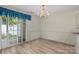 Dining room featuring natural light and a chandelier, perfect for meals at 112 Dujon Ct, Mount Holly, NC 28120