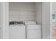 Convenient laundry room with side by side washer and dryer at 112 Dujon Ct, Mount Holly, NC 28120