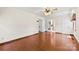 Spacious bedroom with hardwood floors and multiple entry doors, offering flexibility and convenience at 113 Helena St, Mount Holly, NC 28120