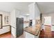 Modern kitchen with stainless steel appliances, granite countertops, and white cabinetry at 113 Helena St, Mount Holly, NC 28120
