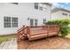 Exterior view of a wooden deck with access to the backyard at 11526 Mcginns Trace Ct, Charlotte, NC 28277