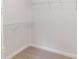 Walk-in closet with carpet and white wire shelving for ample storage space at 11526 Mcginns Trace Ct, Charlotte, NC 28277