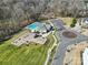 A community offers playground, pool, parking, and green space for residents to enjoy in a planned neighborhood at 13222 Fiore Pl, Huntersville, NC 28078