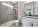 Neutral toned bathroom features a large shower with glass door, a toilet, and vanity at 13222 Fiore Pl, Huntersville, NC 28078