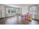 Bonus room features wood floors and has multiple windows at 13222 Fiore Pl, Huntersville, NC 28078