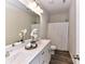 Bathroom featuring a double vanity with modern fixtures and a shower-tub combination with a shower curtain at 134 Kerri Dawn Ln # 117, Locust, NC 28097