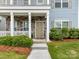 Inviting front porch with stone accents, offering a cozy entrance to the home at 134 Kerri Dawn Ln # 117, Locust, NC 28097