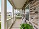 Relaxing front porch with stone detailing, perfect for enjoying the neighborhood view at 134 Kerri Dawn Ln # 117, Locust, NC 28097