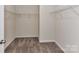 Spacious walk-in closet with wire shelving and neutral carpet, offering ample storage at 134 Kerri Dawn Ln # 117, Locust, NC 28097
