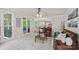 Spacious living room with a large windows, hardwood floors, and views to dining room at 1402 Coachman Dr, Waxhaw, NC 28173
