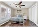 Comfortable bedroom with a full-sized bed, closet, and a window with natural light at 18631 Harborside Dr, Cornelius, NC 28031
