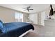 Comfortable primary bedroom with a ceiling fan and a relaxing atmosphere at 18631 Harborside Dr, Cornelius, NC 28031