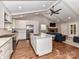 Modern kitchen featuring stainless steel appliances, granite countertops, and an island with bar seating at 2401 Wensley Dr, Charlotte, NC 28210