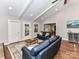 Bright living room featuring hardwood floors, neutral walls, with sight lines into the dining room at 2401 Wensley Dr, Charlotte, NC 28210