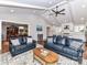 Spacious living area featuring hardwood floors, neutral walls, and a seamless transition to the dining room at 2401 Wensley Dr, Charlotte, NC 28210