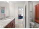 En-suite bathroom offering granite counters and access to bedroom for added convenience at 2606 Walker Rd, Matthews, NC 28105
