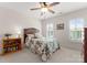 Well-lit bedroom featuring a large window and comfortable bed at 2606 Walker Rd, Matthews, NC 28105