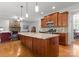 Open kitchen featuring a large center island, stainless steel appliances, and views to the living room at 2606 Walker Rd, Matthews, NC 28105