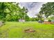 Grassy backyard with a weathered shed at 275 N Garrison Rd, Rock Hill, SC 29730