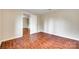 A bright bedroom features hardwood floors and white trim and paneling at 275 N Garrison Rd, Rock Hill, SC 29730