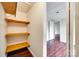 A bright closet features hardwood floors and storage shelves at 275 N Garrison Rd, Rock Hill, SC 29730