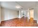 Open-concept room with hard floors, seamlessly blending into a functional kitchen at 275 N Garrison Rd, Rock Hill, SC 29730