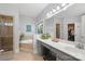 Bright bathroom featuring a soaking tub, walk-in shower, double vanity, and a decorative stained glass window at 3115 Duck Point Dr, Monroe, NC 28110