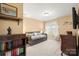 Comfortable bedroom featuring neutral carpet, a daybed, and ample natural light at 3115 Duck Point Dr, Monroe, NC 28110