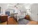 Cozy bedroom with hardwood floors, ceiling fan, and natural light throughout at 3115 Duck Point Dr, Monroe, NC 28110