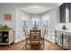 Breakfast nook with a great view, built-in cabinets, and natural light streaming in at 3115 Duck Point Dr, Monroe, NC 28110