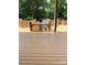 Beautiful stained deck with -proof gate and a view of the nearby lake at 3115 Duck Point Dr, Monroe, NC 28110