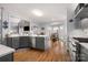 Gourmet kitchen with stainless steel appliances, including an island with seating and a breakfast nook at 3115 Duck Point Dr, Monroe, NC 28110