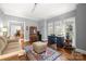 Cozy home office space with hardwood floors, natural light, and vintage furniture at 3115 Duck Point Dr, Monroe, NC 28110