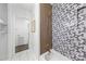 Modern bathroom with stylish wood and mosaic tile, plus updated fixtures and finishes at 4226 Randolph Rd, Charlotte, NC 28211