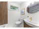 Updated bathroom featuring modern vanity, decorative tile, and stylish accents at 4226 Randolph Rd, Charlotte, NC 28211