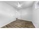 Bedroom featuring neutral walls, wood flooring, and a standard closet at 4226 Randolph Rd, Charlotte, NC 28211