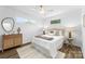 Well-lit bedroom with ample natural light and coordinated decor at 4226 Randolph Rd, Charlotte, NC 28211