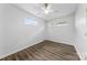 Bright bedroom featuring neutral walls, wood flooring, and natural light at 4226 Randolph Rd, Charlotte, NC 28211