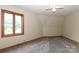 Bright bedroom featuring large windows, neutral walls, and plush carpeting for a cozy feel at 443 Troutman Farm Rd, Statesville, NC 28677