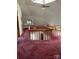 Open loft area with unique architectural details, a ceiling fan, and access to multiple rooms at 443 Troutman Farm Rd, Statesville, NC 28677