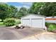 Detached two-door garage provides additional parking or storage options on the property at 443 Troutman Farm Rd, Statesville, NC 28677