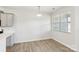 Bright dining area featuring a window and modern lighting at 5254 Spanish Ivy Ln # 133, Indian Land, SC 29707