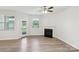 Bright living room with fireplace and access to a backyard view at 5254 Spanish Ivy Ln # 133, Indian Land, SC 29707