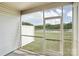Screened porch with views of the lake at 5254 Spanish Ivy Ln # 133, Indian Land, SC 29707