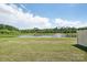 Scenic pond view showcasing lush greenery, serene water feature, and natural beauty at 5254 Spanish Ivy Ln # 133, Indian Land, SC 29707
