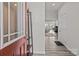 Bright entryway featuring hardwood floors and a view into the open-concept living space at 5625 Axil Ln, Charlotte, NC 28269