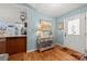 Welcoming entryway with hardwood floors, a decorative table, and a view into the adjacent living spaces at 5764 Grassy Creek Rd, Denver, NC 28037