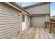 Wooden back porch featuring neutral siding and a view of the outdoor area at 60 Valley Nw St, Concord, NC 28025
